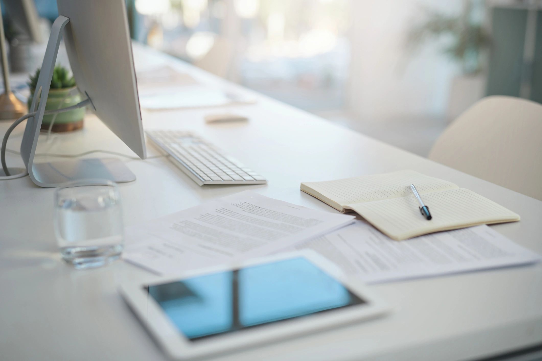 Patent and technology documents on a modern desk